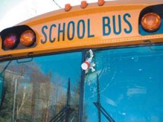 Flying cup full of ice frightens school bus driver and students