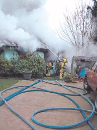 Morning home fire ends quiet weekend