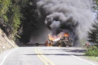 Flames fill vehicle on 410 pass