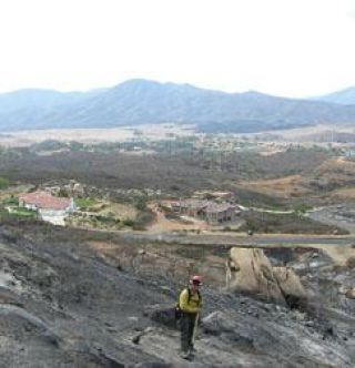 Firefighters join massive effort to fight California wildfires