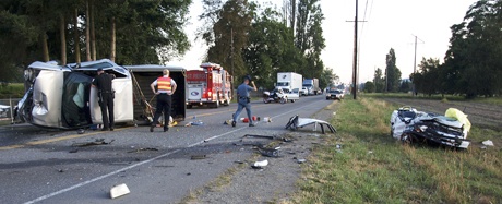 Washington State Patrol investigate the scene of a deadly two-car accidents that killed a 65-year-old Lake Tapps woman.