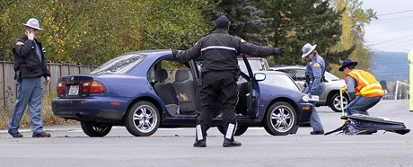 State troopers investigate a two-car collision at the intersection of State Route 410 and Mundy Loss Road.