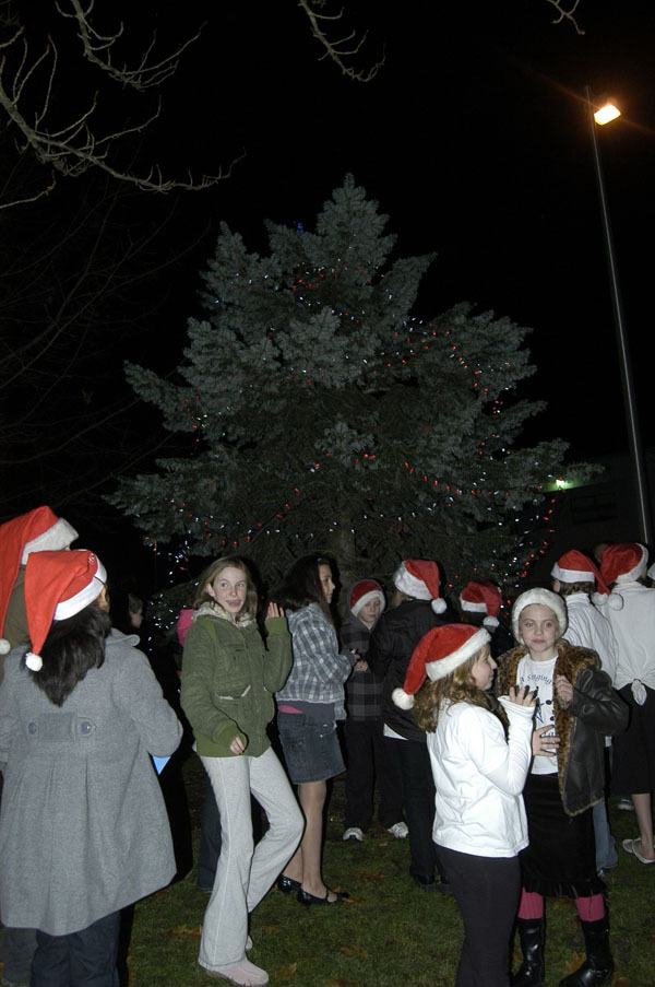 Children gather around the city of Bonney Lake's Christmas Tree during the 2009 tree lighting. The Public Safety Building will be the merry place to be Saturday