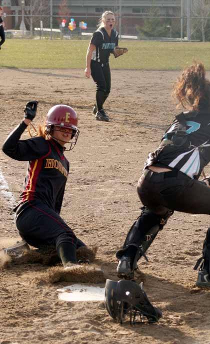 EHS's Courtney Cox slides safely into home against Bonney Lake.