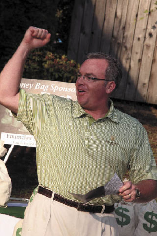 Phil Bivens pumps his fist in victory after 18 holes of action at the Aug. 5 Enumclaw  Chamber of Commerce fundraising Golf Classic at the Enumclaw Golf Course