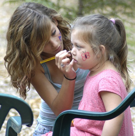 A young girl gets her face painted during the 2009 National Night Out event at Ken Simmons Park in Bonney Lake Aug. 4.