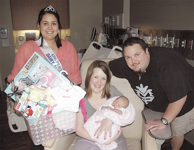 The King County Dairy Women presents a gift basket to Shannon and Kaleb Uhde of Enumclaw