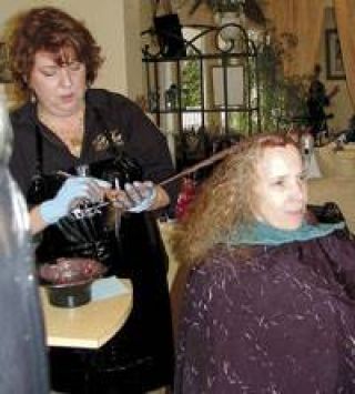 Leisa Erwin adds color to Deborah Hansen's hair