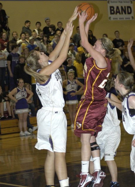 Sumner's Ashley Delaney blocks a shot of a White River player during the Spartans' 64-58 loss at home Jan. 12.