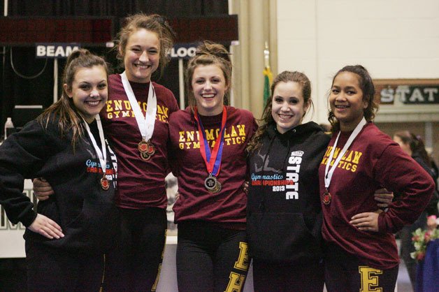 The Enumclaw Hornets gymnastic team won the state crown Feb. 15 at the Tacoma Dome for the second consecutive year. The girls competed in individual events taking gold