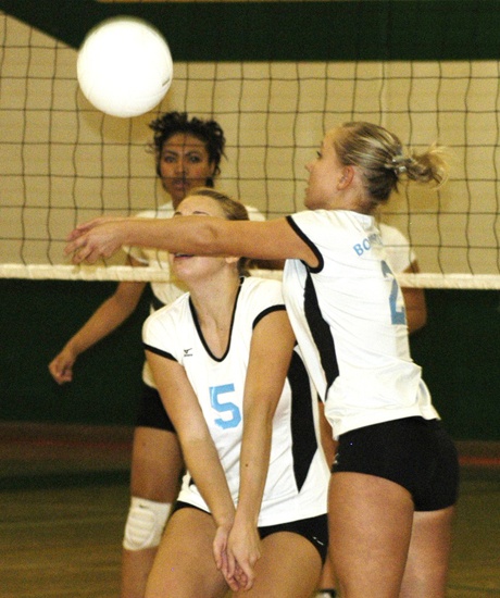 Bonney Lake's Hannah Healey (2) volleys the ball as teammate Ashley Reisen is backing up on the play.