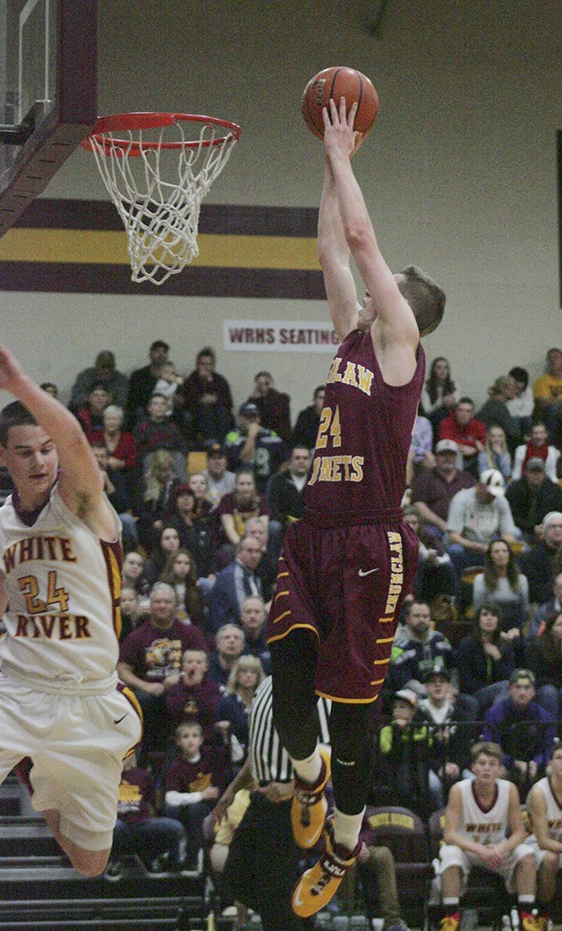 Enumclaw's Josh Erickson scores on a fast break during the Hornets vs. Hornets game Friday at White River High.