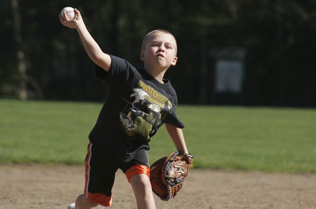 Conner Smith practices his pitching at Allan Yorke Park Saturday afternoon.