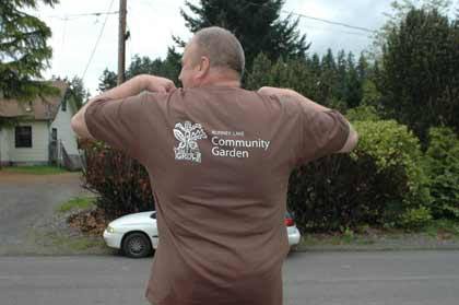 Stew Bowen models one of the new T-shirts supporting the Bonney Lake Community Garden.