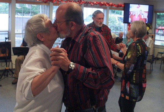 Sandi and Jake Knaus finish their swing dancing at the Senior Center 25th Anniversary with a romantic flourish.