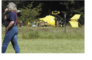 Two people escaped serious injuries after a gyrocopter crashed Saturday near a private airfield.