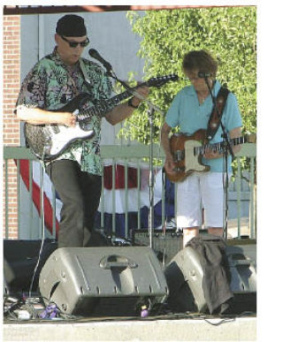 The first of a series of summer concerts was in Heritage Park Friday. Above