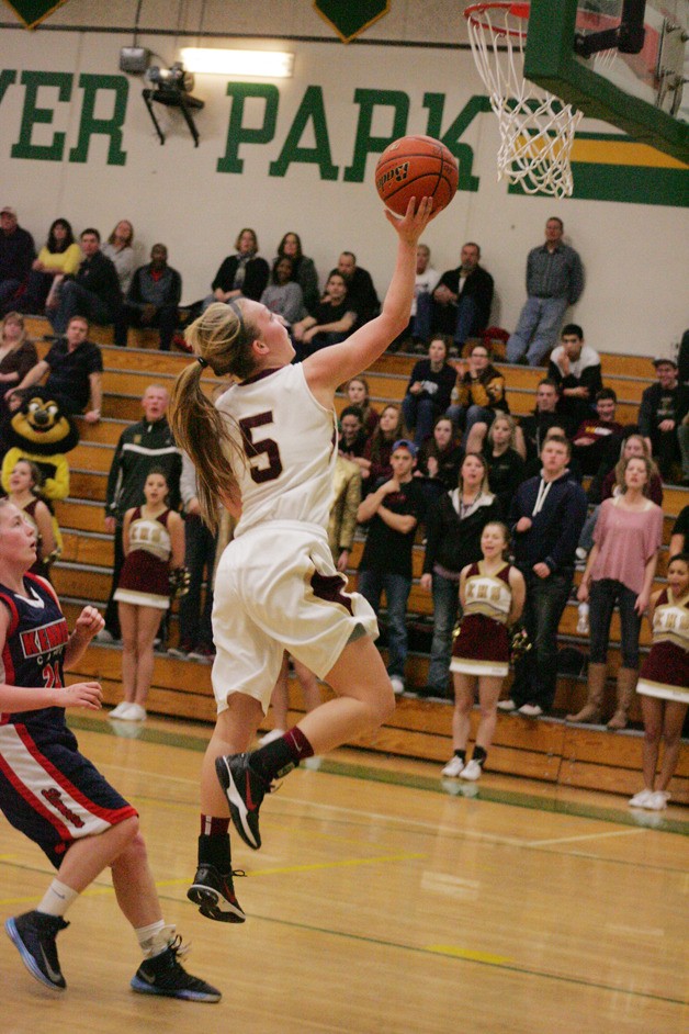 Katie Holland shots a layup for Enumclaw in the Hornets defeat of Kennedy in the West Central District playoff Jan. 15 at Clover Park High.