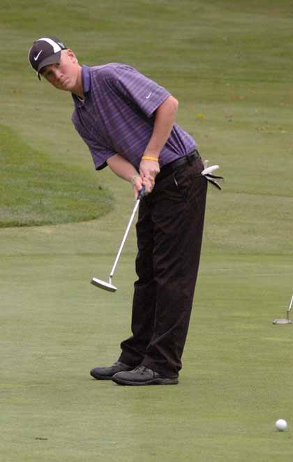 Brandon Barlow takes a putt during competition with White River at Tapps Island Oct. 7.