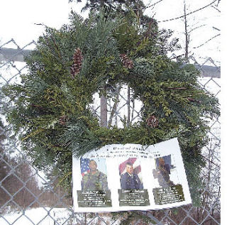 It was two years ago on Dec. 21 when a UH-60 Black Hawk helicopter carrying three soldiers from Fort Lewis crashed on Mount Peak during a night training exercise in preparation for deployment to Iraq. A small group of Enumclaw residents gathered Dec. 23 to place a wreath near the crash site in honor of those soldiers who died that night. Inclement weather postponed the original outing. Enumclaw Chamber of Commerce members also plan to send a card and photographs taken from the ceremony to the soldiers’ families. Earlier in the year