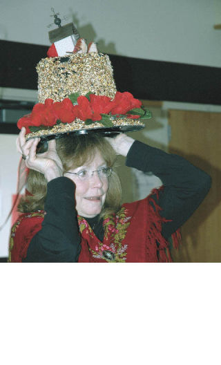 Toni Clay paraded a hat  created by Enumclaw Garden Club member Maggie  Hobert-Kinney before she died in January. Hobert-Kinney’s hats were always a treat at the group’s annual Breakfast for the Birds. Karen Jezzelli was the winner of the Red Birds and Roses category and she joined other winners Eileen Griffiths