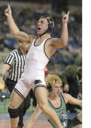 Addison Tracy rejoices after capturing the state 145-pound title Saturday night.