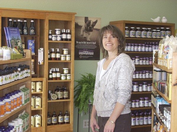 Kim Ode stands among her bevy of all-natural products in newly opened store