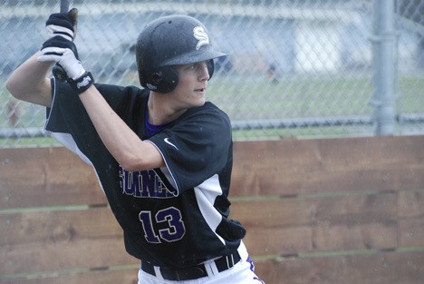 Luc Powers-Hubbard takes up the bat away against Washington High April 17.