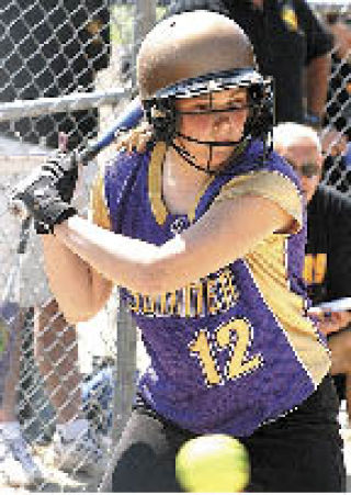 Sophomore catcher  Dani Babcock takes a  look at a pitch.