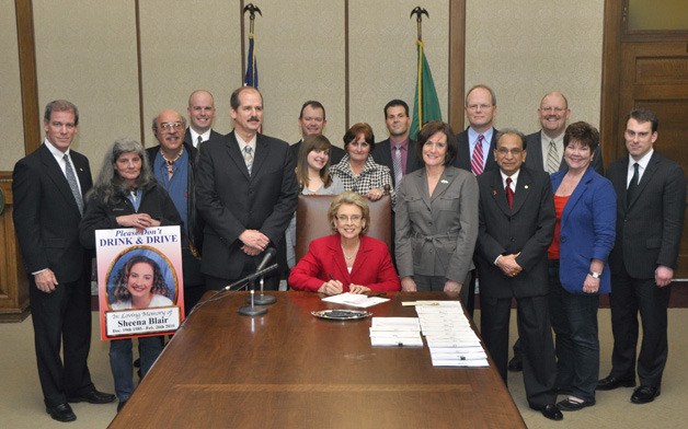 Gov. Chris Gregoire signs House Bill 2216 April 6