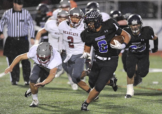 Sumner running back Brandon Tuilaepa cuts up field during the 28-14 win against W.F. West on Nov. 15.