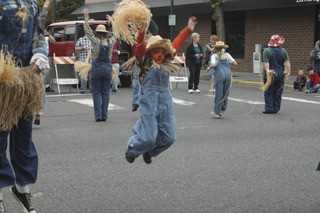 A Dancing Scarecrow leaps during the Autumn Evening event in Sumner.