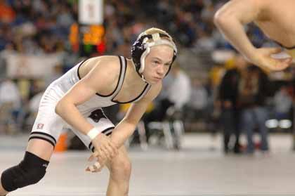 Colton Tracy stares down his foe in the championship round of the 3A state tournament.