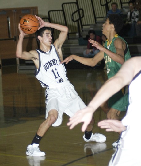 Ramsey Thoms looks for a teammate to pass the ball to during the second half of the Panthers' 50-44 loss to Clover Park on Dec. 11.