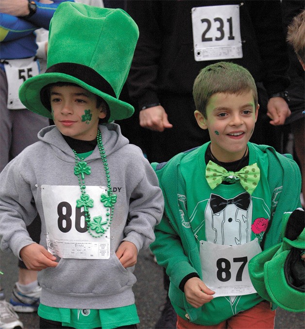 Showing proper spirit for Saturday’s St. Paddy’s Fun Run were Brady (86) and Carter McGann. The two ran in the 12-and-younger division during the event