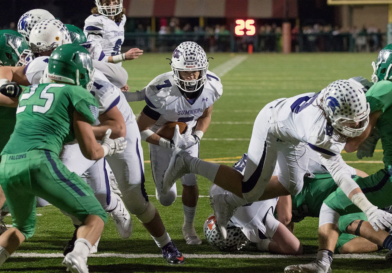 The Spartans took out the Woodinville Falcons in a 16-13 victory. All photos by Vince Miller.