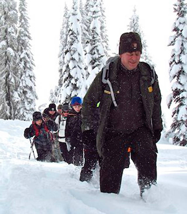 Want to hike through the snow? Mount Rainier offers ranger-guided snowshoe walks around the mountain. Photo courtesy of the National Park Service