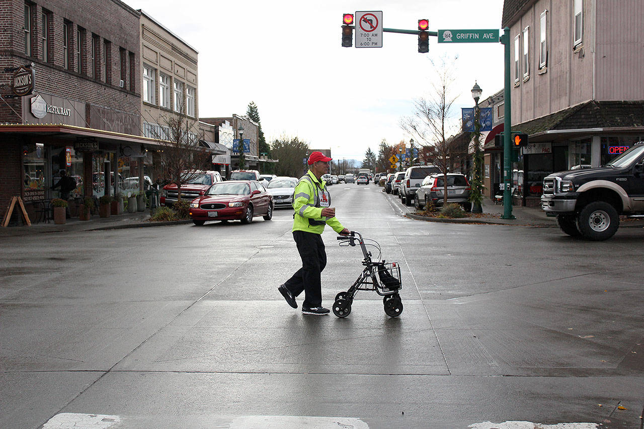 After his interview, Don Stevenson — the Pacing Parson — went straight back to walking SR 164 to Auburn. He’s averaging 14 miles a day, but hopes to bring his pace back up to 30 in the near future. Photo by Ray Still