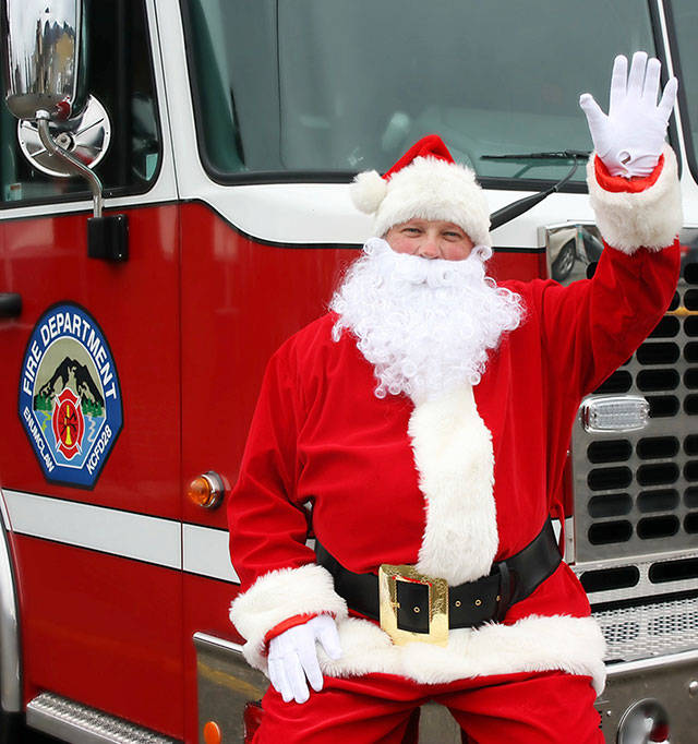 Santa Claus, with the Enumclaw Fire Department and the Buckley Volunteer Firefighter Association, will be touring the Plateau - Dec. 6-9 in Enumclaw and Dec. 11-15 in Buckley. Submitted photo