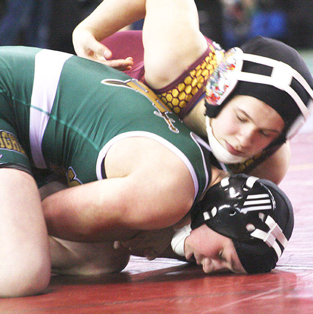 Payton Stroud, shown here on the way to a early victory at the state tournament, is ranked No. 10 in the nation in her weight class. Photo by Kevin Hanson