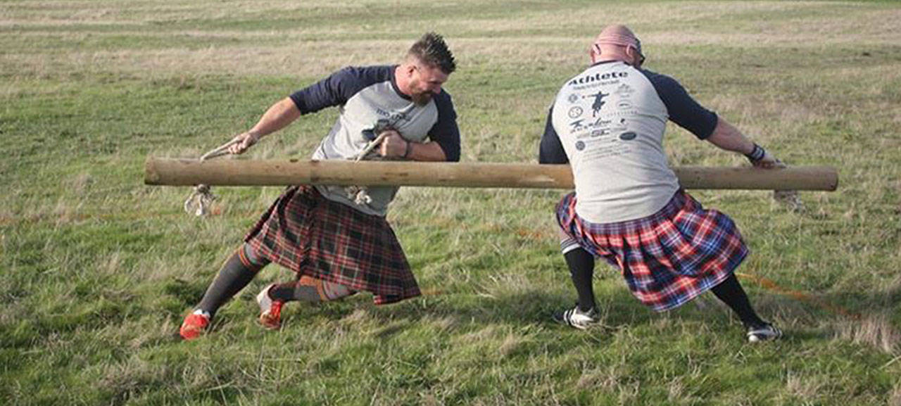 “Scottish Sumo” is a special event done by Mo-Throw, and includes two competitors attempting to push each other down or out of the ring with a large log. Photo courtesy Dan Sowers