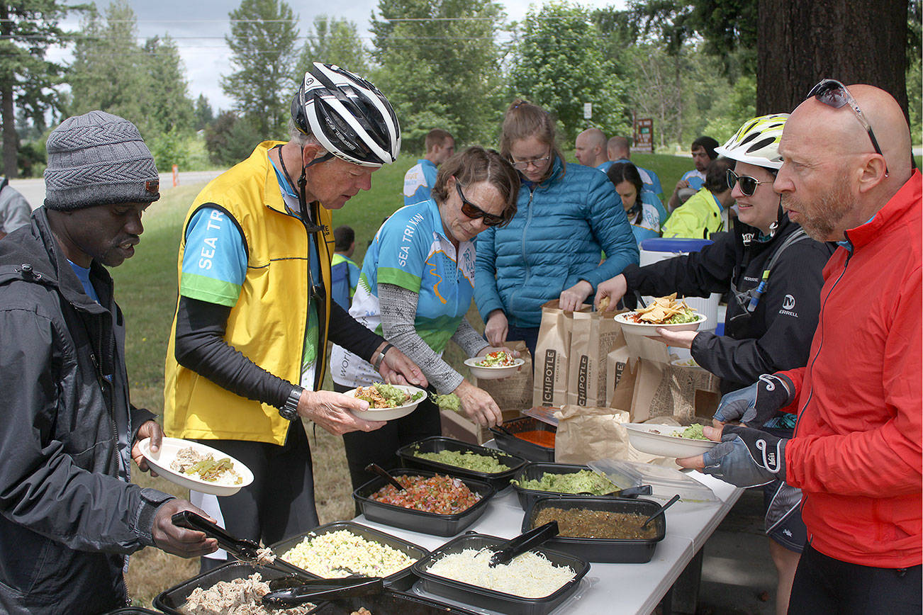 Refugee supporters ride through Enumclaw