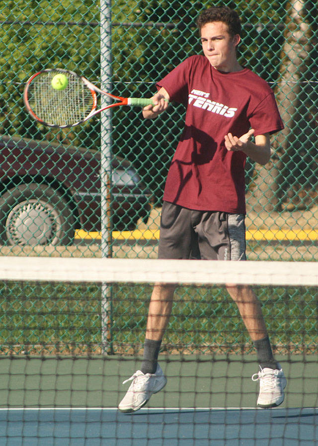 Enumclaw High senior Brennan Gallagher will be part of the Hornets’ varsity roster again this year. This photo is from a home-court match last season. File photo by Kevin Hanson