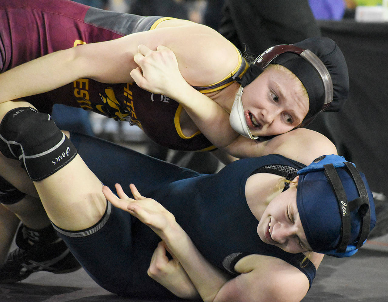 White River’s Claire DiCugno returns for another season on the mat. In this photo from last year’s state meet, she handles an opponent on the way to a second-place finish. File photo by Kevin Hanson