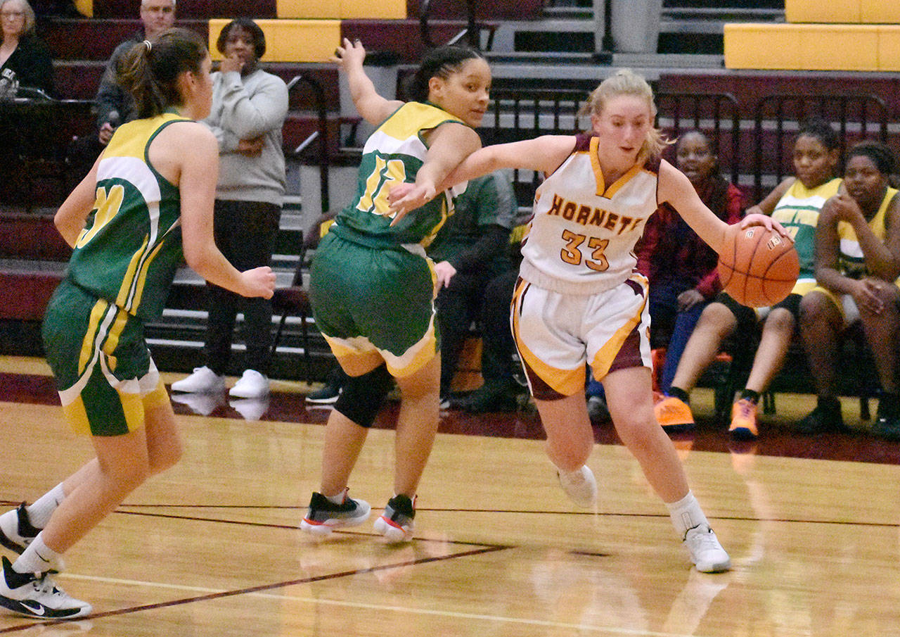 White River sophomore Brooke Mahler drives to the hoop during Friday night’s lopsided Hornet victory over the visiting Foss Falcons. Photo by Kevin Hanson