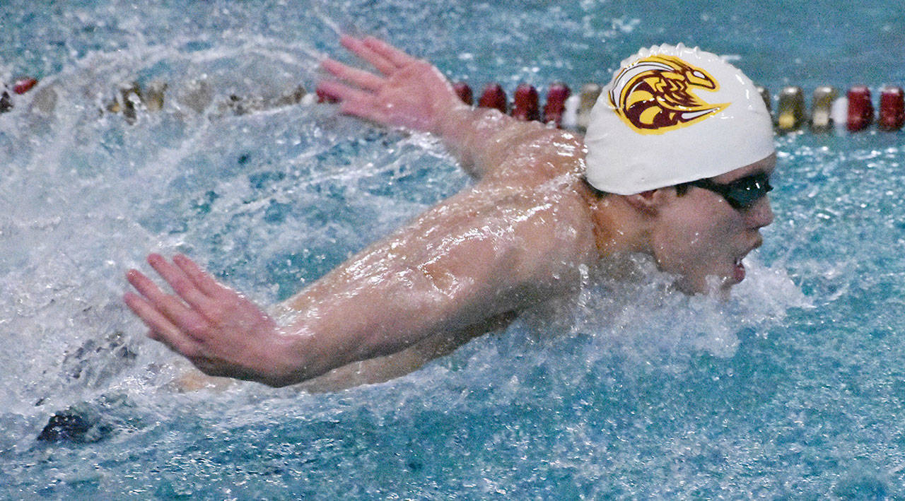 Ben Jazbutis took first in the butterfly event during a Jan. 24 meet with Todd Beamer. Photo by Kevin Hanson