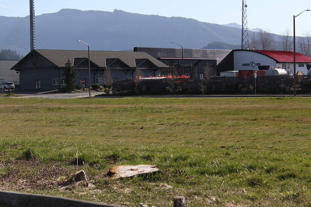 Pursuit Distillery won’t be moving closer to downtown Enumclaw, but this plot of land is still planned to be paved for free parking — if the Thunder Dome doesn’t need it for an event. Photo by Ray Miller-Still