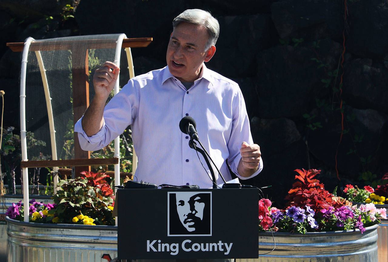 STEVE HUNTER / Kent Reporter                                King County Executive Dow Constantine talks about his 2020 Strategic Climate Action Plan on Aug. 27 at the Paradise Parking Plots Community Garden in Kent.