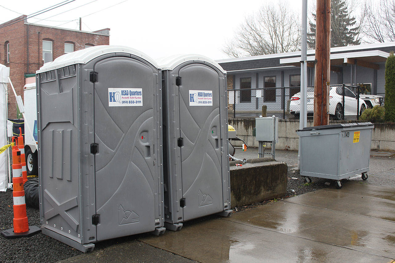 The body was found in one of these portable toilets on Myrtle Avenue. Photo by Ray Miller-Still