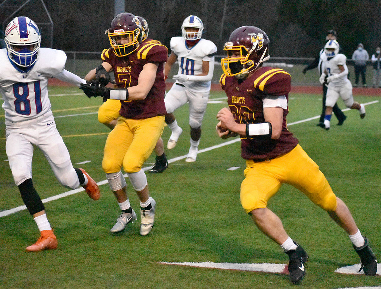 White River’s Friday night victory over the visiting Washington Patriots was sparked by a ground attack. Photo by Kevin Hanson